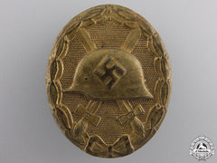 A Gold Grade Wound Badge