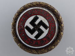 A Golden Party Badge; Large Version