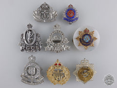 A Group Of Eight Common Wealth Regimental Pins