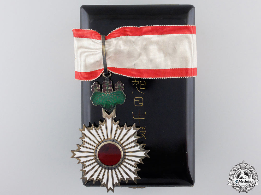 a_japanese_order_of_the_rising_sun;3_rd_class_commander_a_japanese_order_559e6978b73a9_1