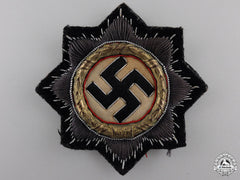 A Kriegsmarine German Cross In Gold, Cloth Version