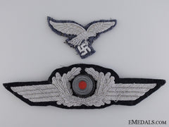 A Luftwaffe Officer Visor Wreath And Eagle