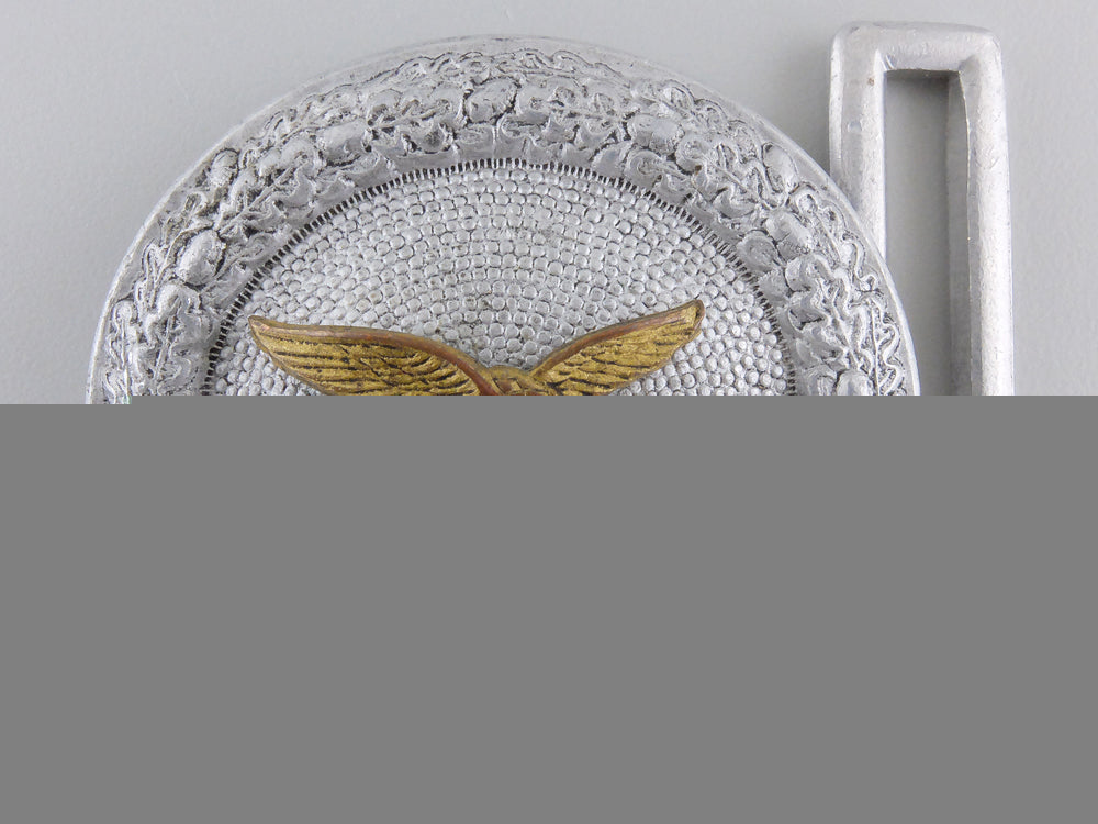 a_luftwaffe_officer’s_belt_buckle;_d.r.g.m._a_luftwaffe_offi_55b8fa421b434
