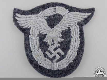 a_luftwaffe_pilot's_badge_in_cloth;_padded_version_a_luftwaffe_pilo_55c0ce05170b4