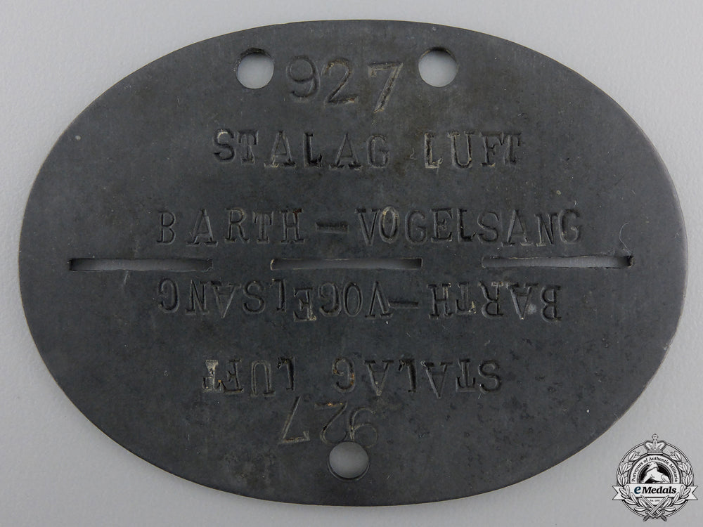 a_luftwaffe_stalag_guard’s_id_disc_a_luftwaffe_stal_55282a17d20fb