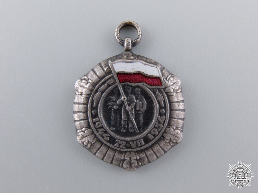a_miniature_polish_medal_for_the_tenth_year_of_the_people's_republic1944-1954_a_miniature_poli_54eb8d5b6c84b