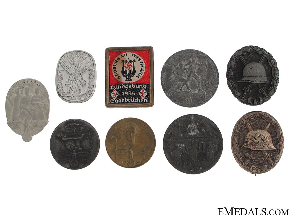 a_mixed_lot_of_german_tinnies_and_badges_a_mixed_lot_of_g_51069bf023a27