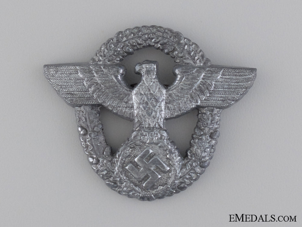 a_police_cap_badge_by_friedrich_linden,_lüdenscheid_a_police_cap_bad_54106c2807ecb