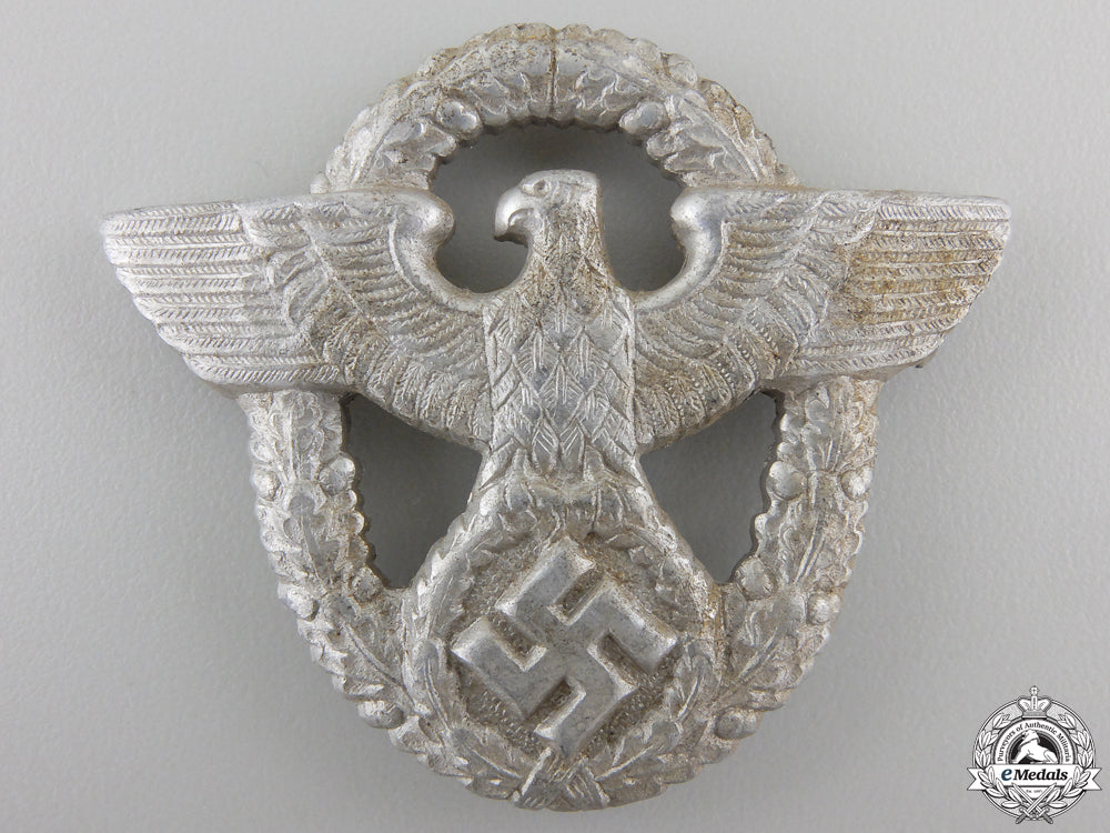 a_police_cap_badge_by_ogl_a_police_officer_55c238e5200c8