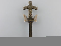 A Polish Krakow Sword Badge