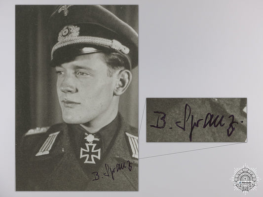 a_post_war_signed_photograph_of_a_knight's_cross_with_oakleaves_recipient_a_post_war_signe_54997aad9704d