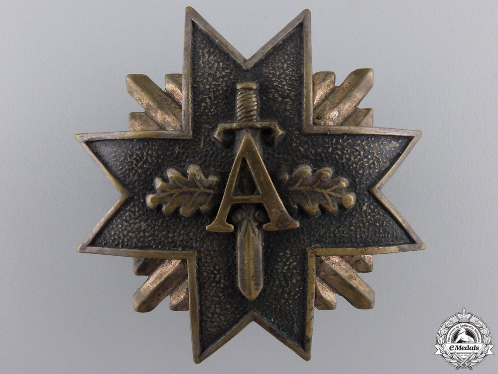 a_pre_second_war_latvian_military_badge_with_swords_a_pre_second_war_552e7bf2a32c1