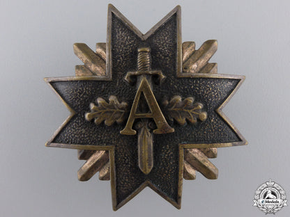 a_pre_second_war_latvian_military_badge_with_swords_a_pre_second_war_552e7bf2a32c1