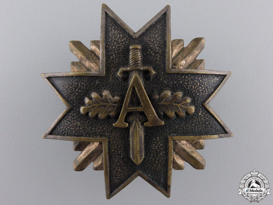 a_pre_second_war_latvian_military_badge_with_swords_a_pre_second_war_552e7bf2a32c1