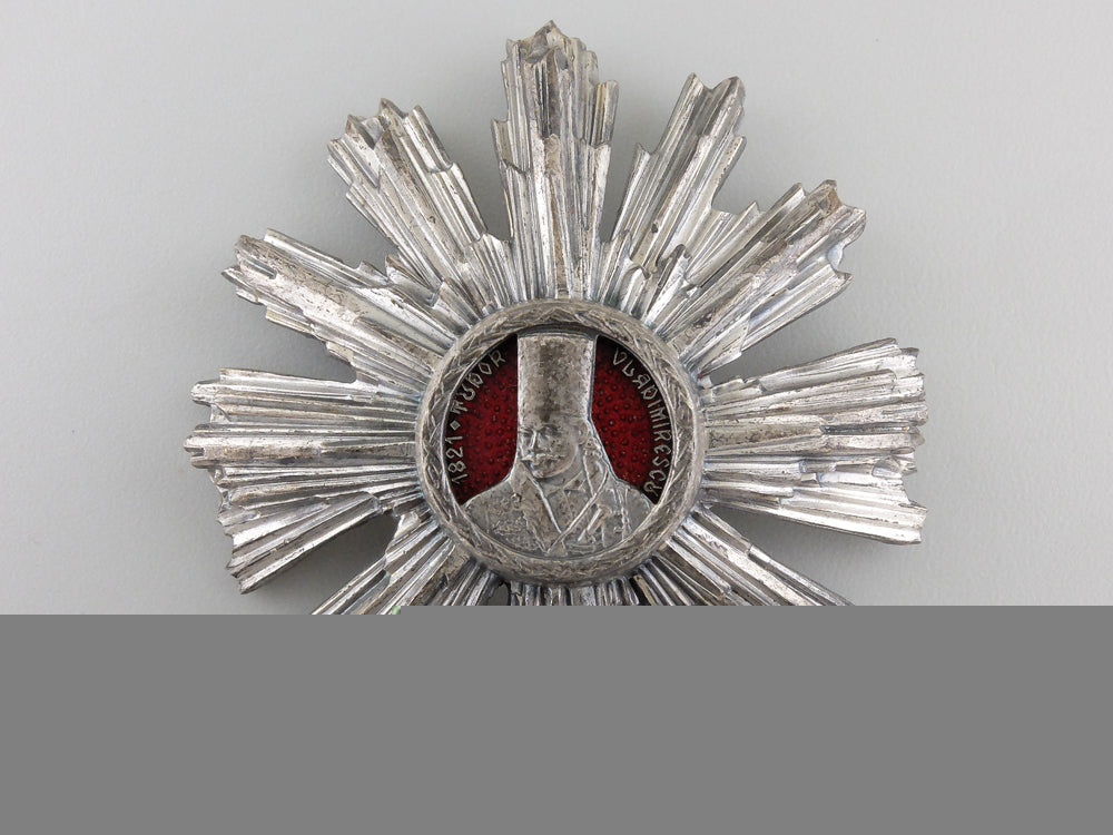 a_romanian_order_of_tudor_vladimirescu;4_th_class_star_a_romanian_order_55c0fce742dbf