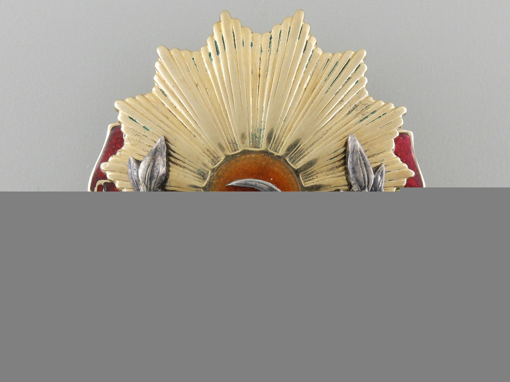 a_romanian_order_of_labour;_first_class_in_gold_a_romanian_order_55d48509ca6b7