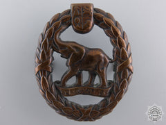 South Africa. A Second War South African Native Military Corps Cap Badge