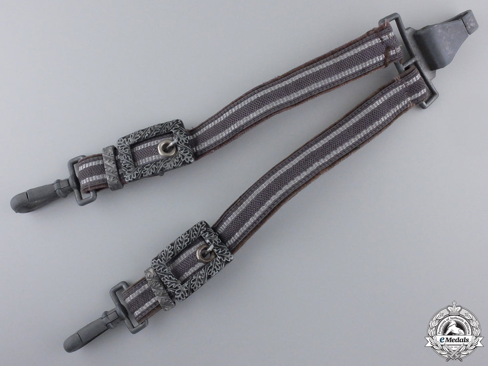a_set_of_luftwaffe_dagger_hangers_a_set_of_luftwaf_5531213d2ed2b