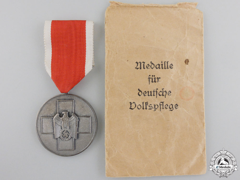 a_social_welfare_medal_with_packet_of_issue_a_social_welfare_55ae623974dd5