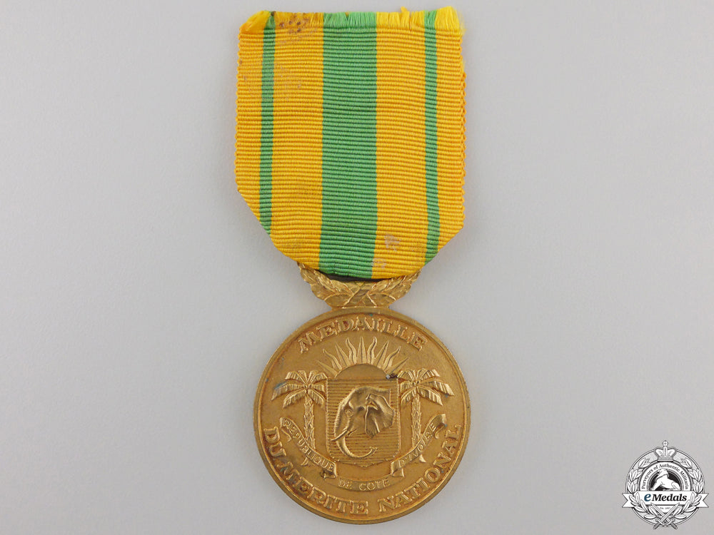 an_ivory_coast_medal_of_national_merit_medal;_gold_grade_a_south_african__5565e9ed7e75b