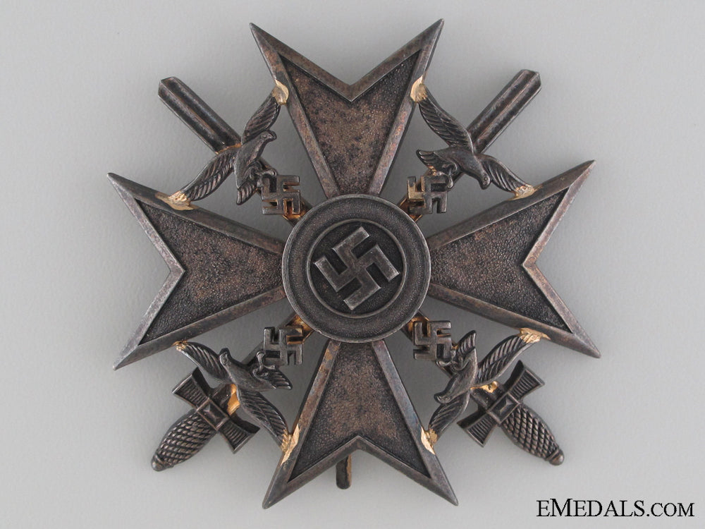 a_spanish_cross_in_bronze_with_swords_a_spanish_cross__53557c2db0dec