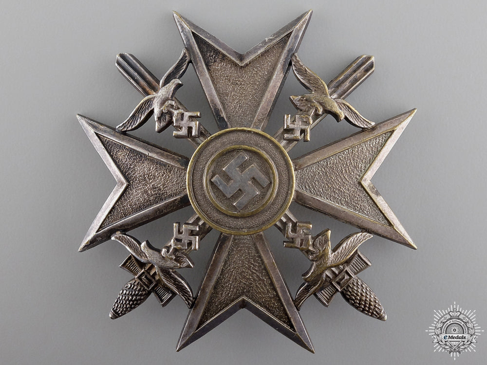 a_spanish_cross_with_swords_by_otto_schickle;_silver_grade_a_spanish_cross__54bd31ed0c6f7