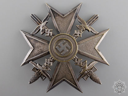 a_spanish_cross_with_swords_by_otto_schickle;_silver_grade_a_spanish_cross__54bd31ed0c6f7