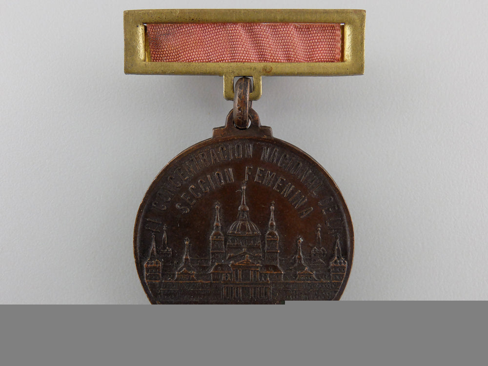 a_spanish_falange_tenth_anniversary_of_the_women's_division_medal1934-1944_a_spanish_falang_55c5065ecaeb1