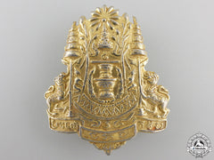 A Thai Police/Defence Force Cap Badge