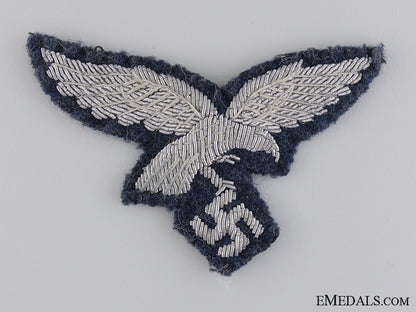 a_uniform_removed_luftwaffe_nco's_breast_eagle_a_uniform_remove_540f3e37e66bd