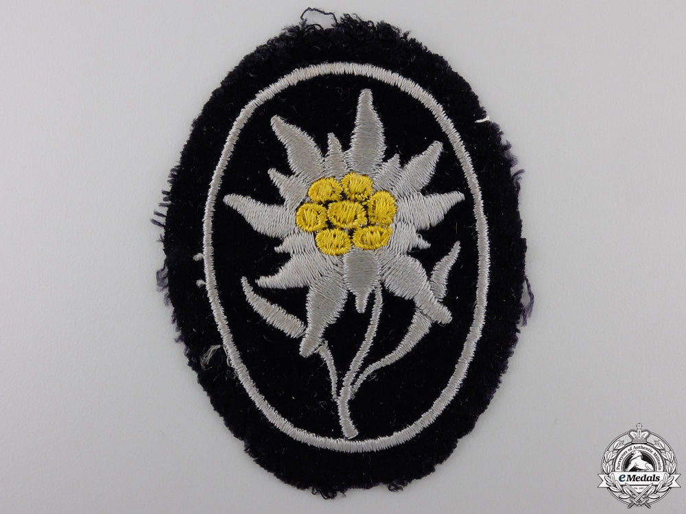 a_uniform_removed_ss_gebirgstruppen_badge_a_uniform_remove_55535aeaada3f