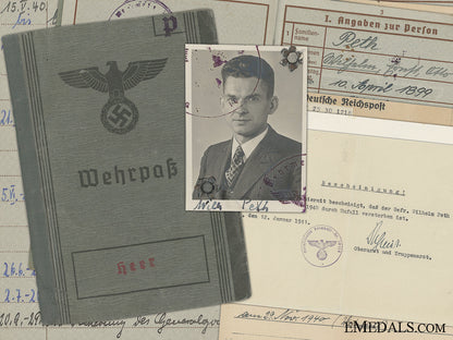 a_wehrpass_and_documents_to_the353_regiment;1940_accident_a_wehrpass_and_d_546b94fa54ec2