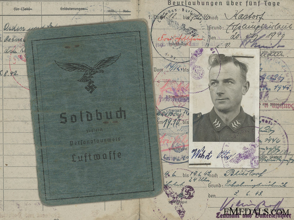 a_soldbuch_to_the695_th_heavy_flak_battalion;_captured_a_wehrpass_to_th_546e49c65726e