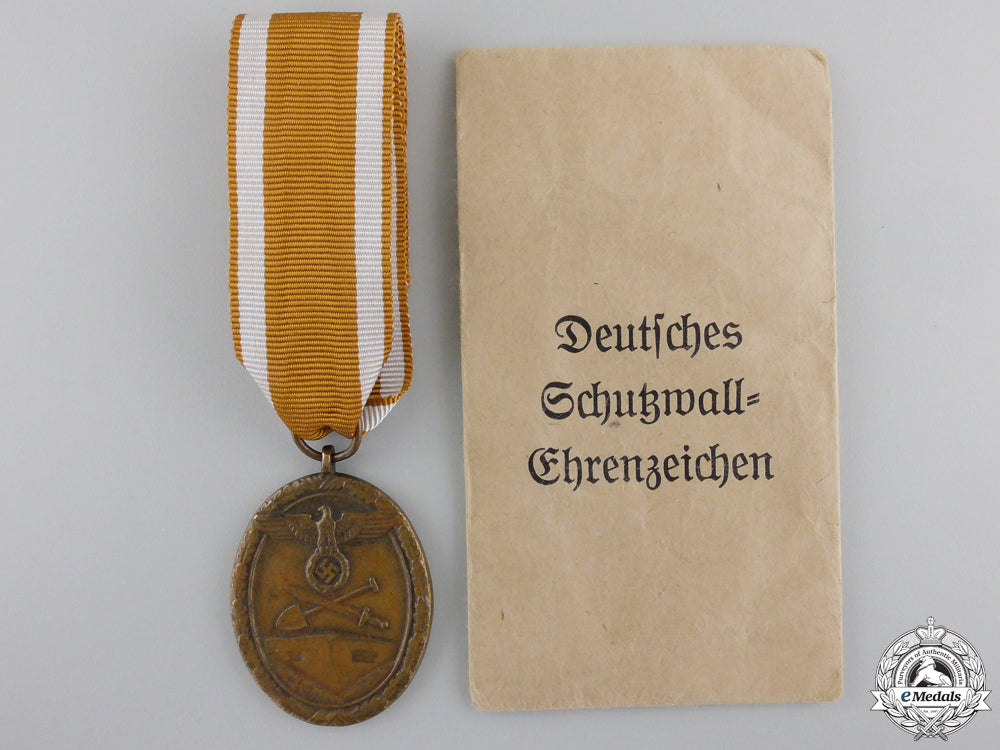 a_west_wall_medal_with_packet_of_issue_a_west_wall_meda_55ae61176ac45