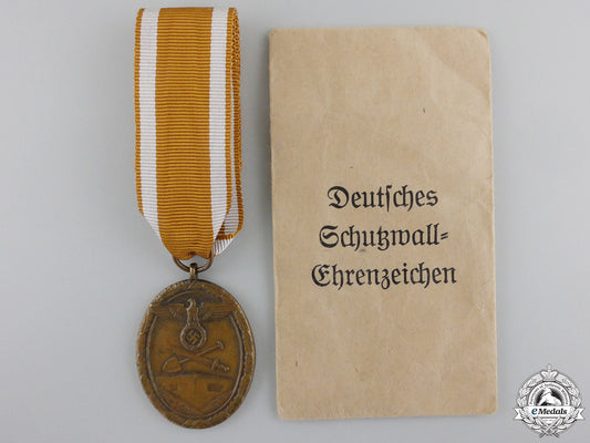 a_west_wall_medal_with_packet_of_issue_a_west_wall_meda_55ae61176ac45