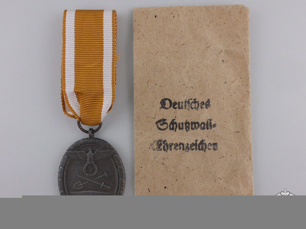 a_west_wall_medal_with_packet_of_issue_a_west_wall_meda_55b6441a67c88