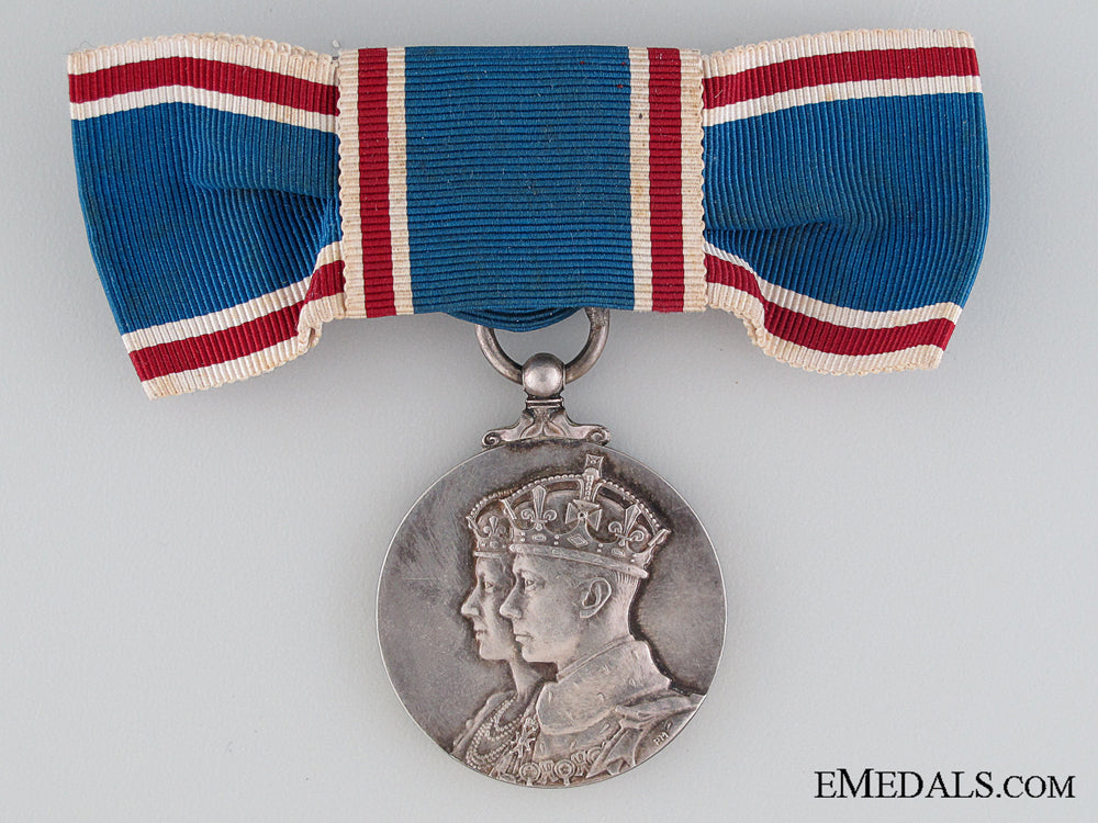 a_woman's_coronation_medal1937_a_woman_s_corona_530b64e85446b