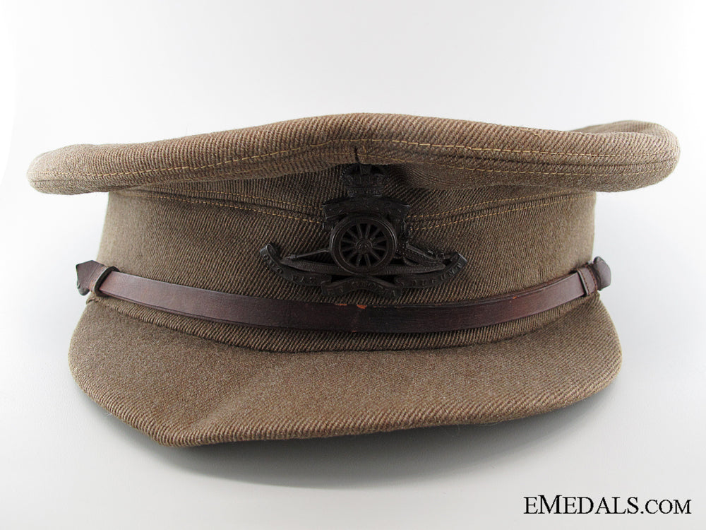 a_wwi_royal_artillery_officer's_peaked_service_cap_a_wwi_royal_arti_53342e2ba8629