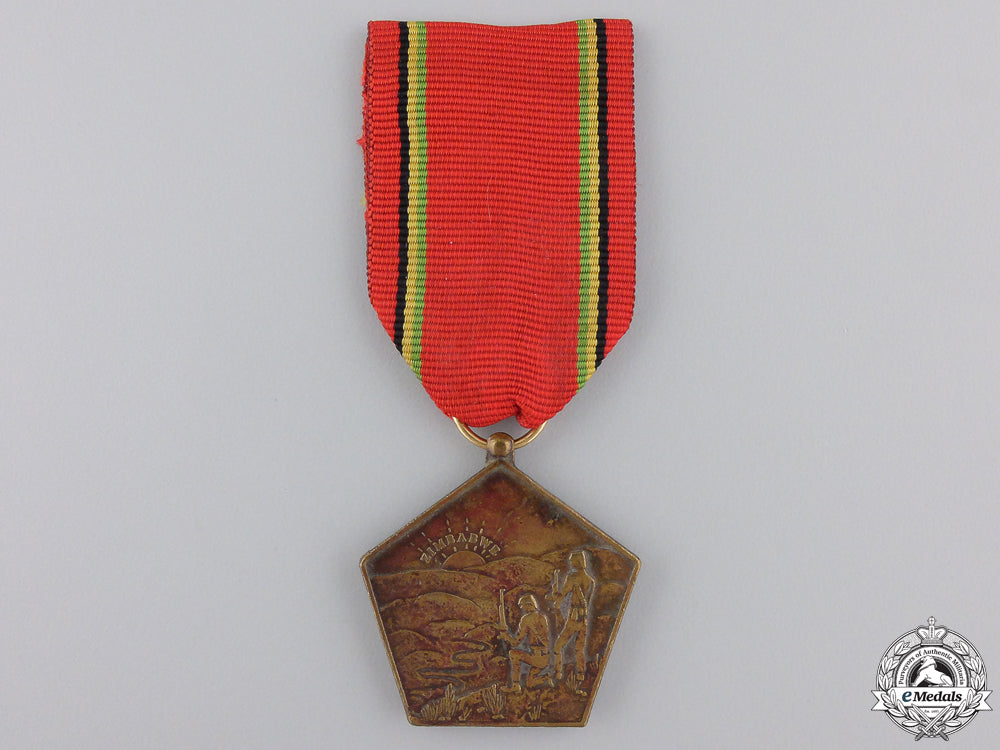 zimbabwe._a_liberation_medal;_numbered_a_zimbabwe_liber_551d6aba2b63a