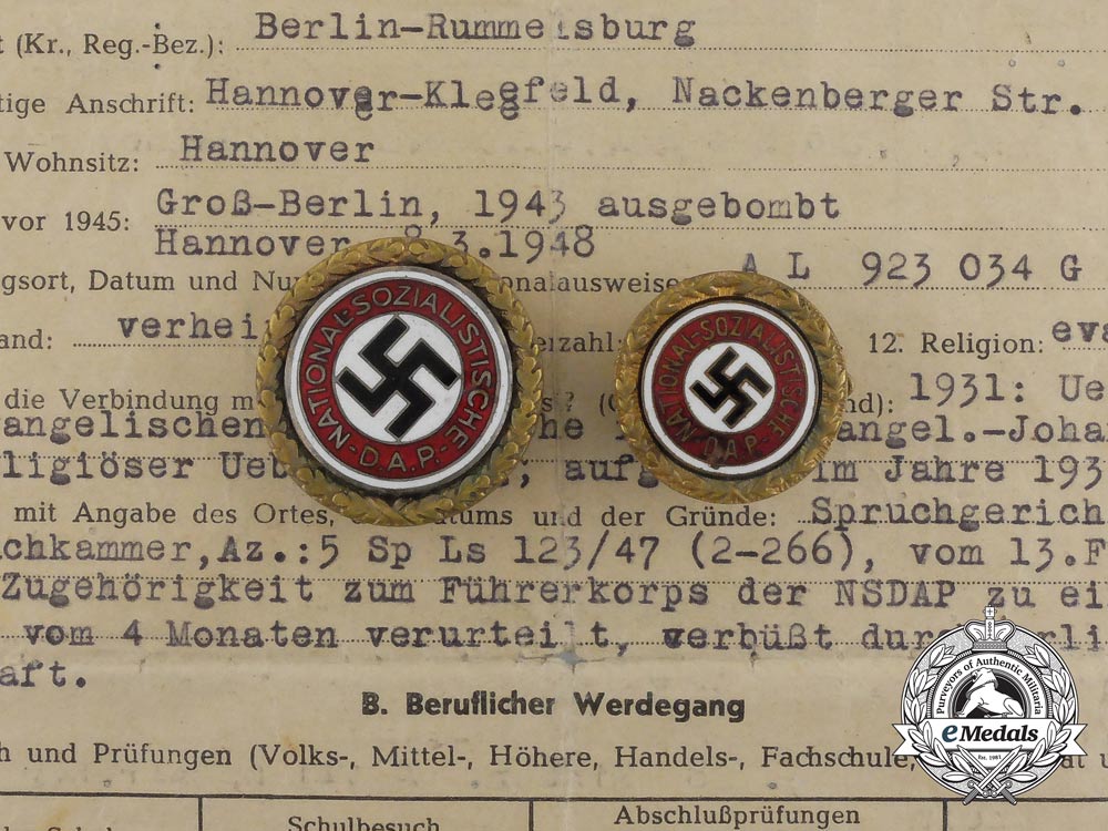 two_golden_party_badges_to_ortsgruppenleiter_beister;_führer_corps_of_the_nsdap_aa_0110