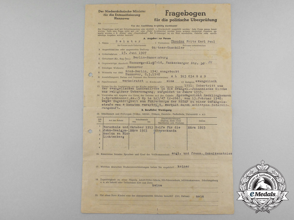 two_golden_party_badges_to_ortsgruppenleiter_beister;_führer_corps_of_the_nsdap_aa_0111