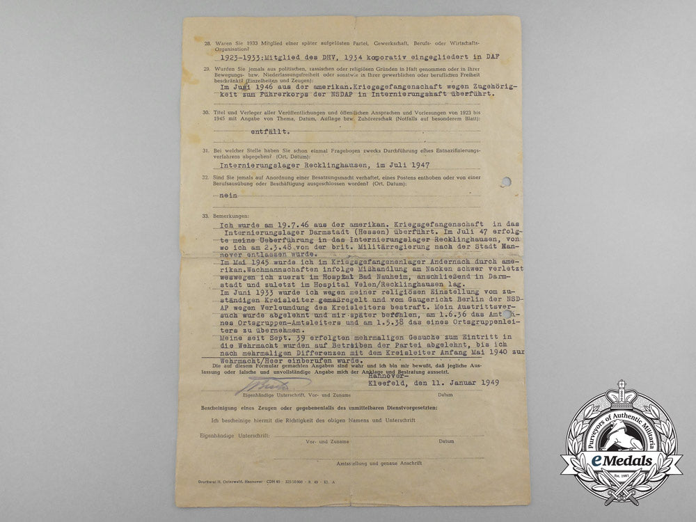 two_golden_party_badges_to_ortsgruppenleiter_beister;_führer_corps_of_the_nsdap_aa_0112