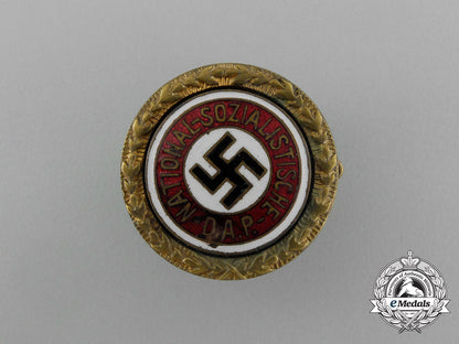 two_golden_party_badges_to_ortsgruppenleiter_beister;_führer_corps_of_the_nsdap_aa_0119