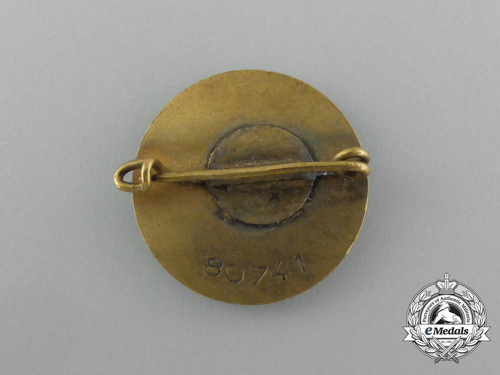 two_golden_party_badges_to_ortsgruppenleiter_beister;_führer_corps_of_the_nsdap_aa_0120