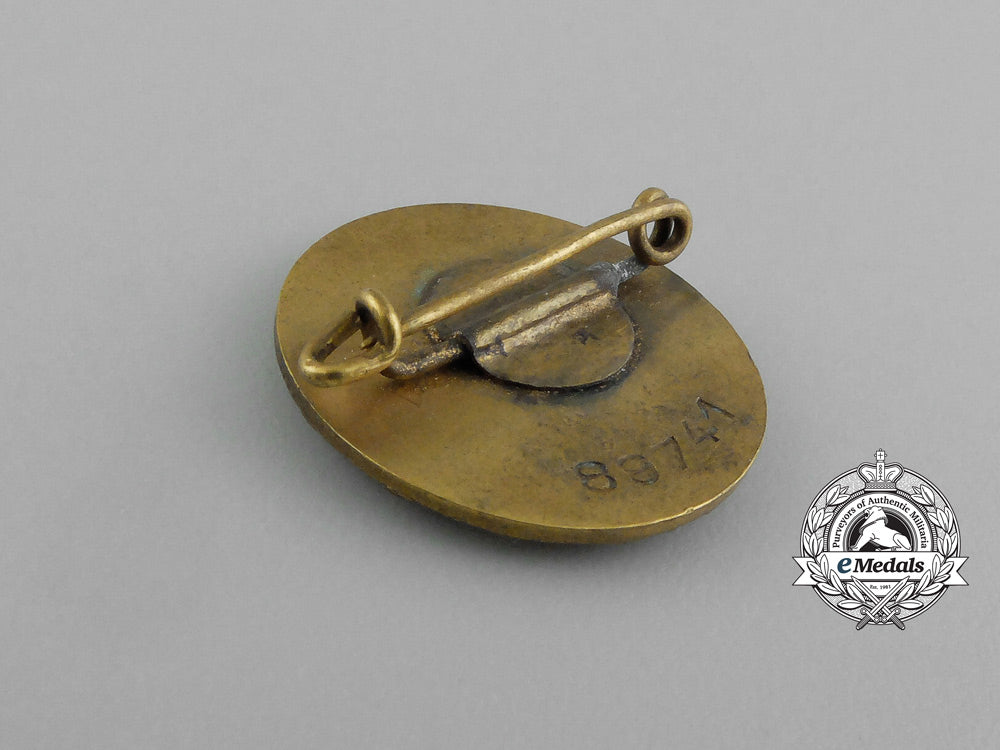 two_golden_party_badges_to_ortsgruppenleiter_beister;_führer_corps_of_the_nsdap_aa_0121