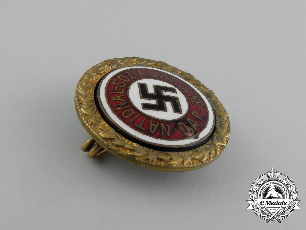 two_golden_party_badges_to_ortsgruppenleiter_beister;_führer_corps_of_the_nsdap_aa_0122