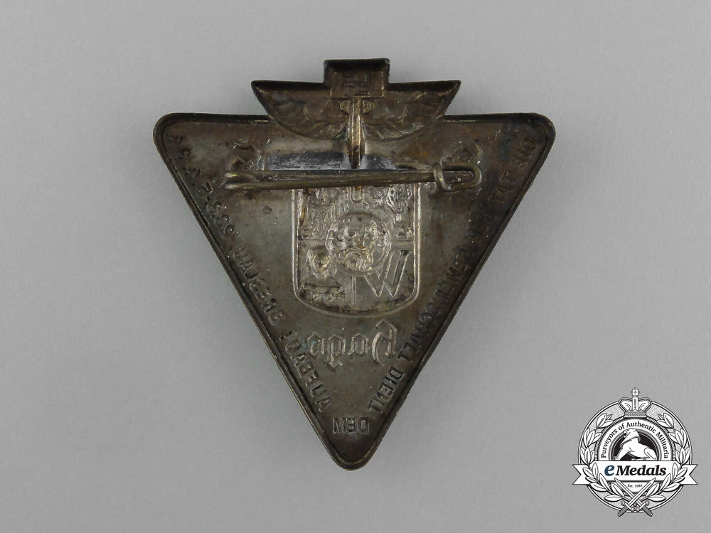 a1934_ns-_hago“_the_deed_of_the_community_aids_the_reconstruction”_badge_aa_0407