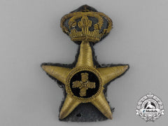 An Italian Colonial Forces Administrative Corps Badge
