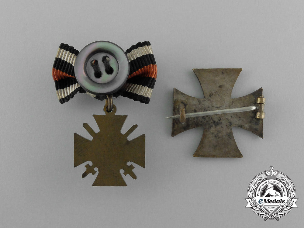 a_grouping_of_two_first_war_german_boutonnieres_and_badges_aa_0464