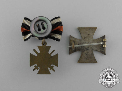 a_grouping_of_two_first_war_german_boutonnieres_and_badges_aa_0464